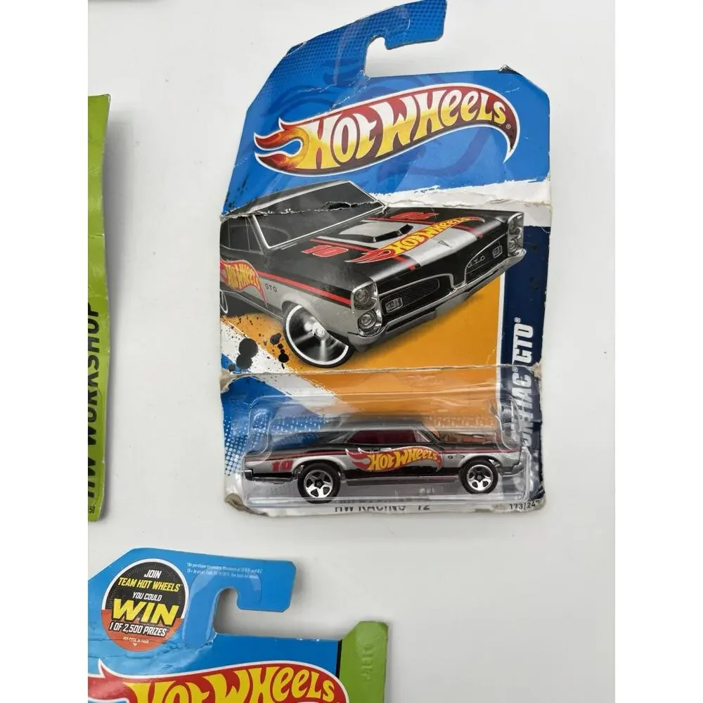 Lot of 9 Hot Wheels 2007-2013 Diecast Cars New Sealed Card Damage